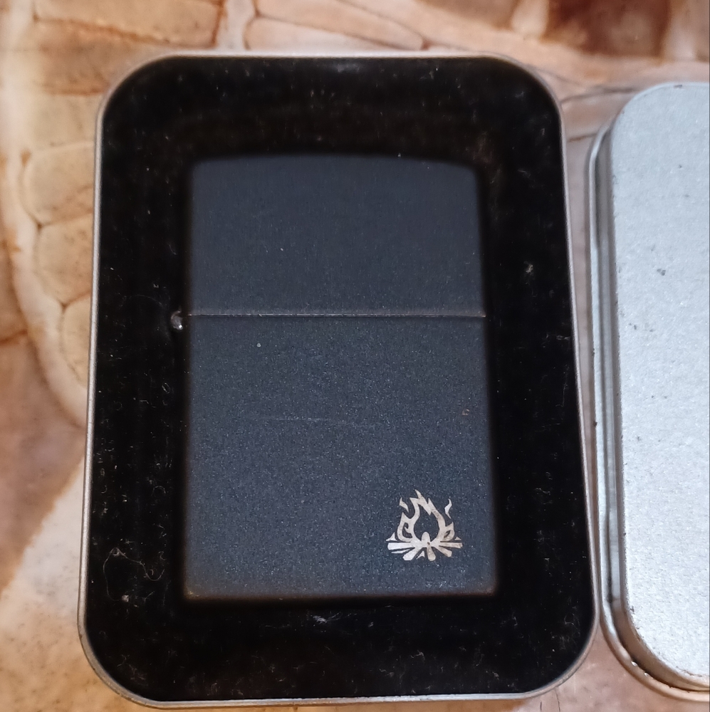 Zippo Pitch Black Zippo with campfire in case never lit like new in case